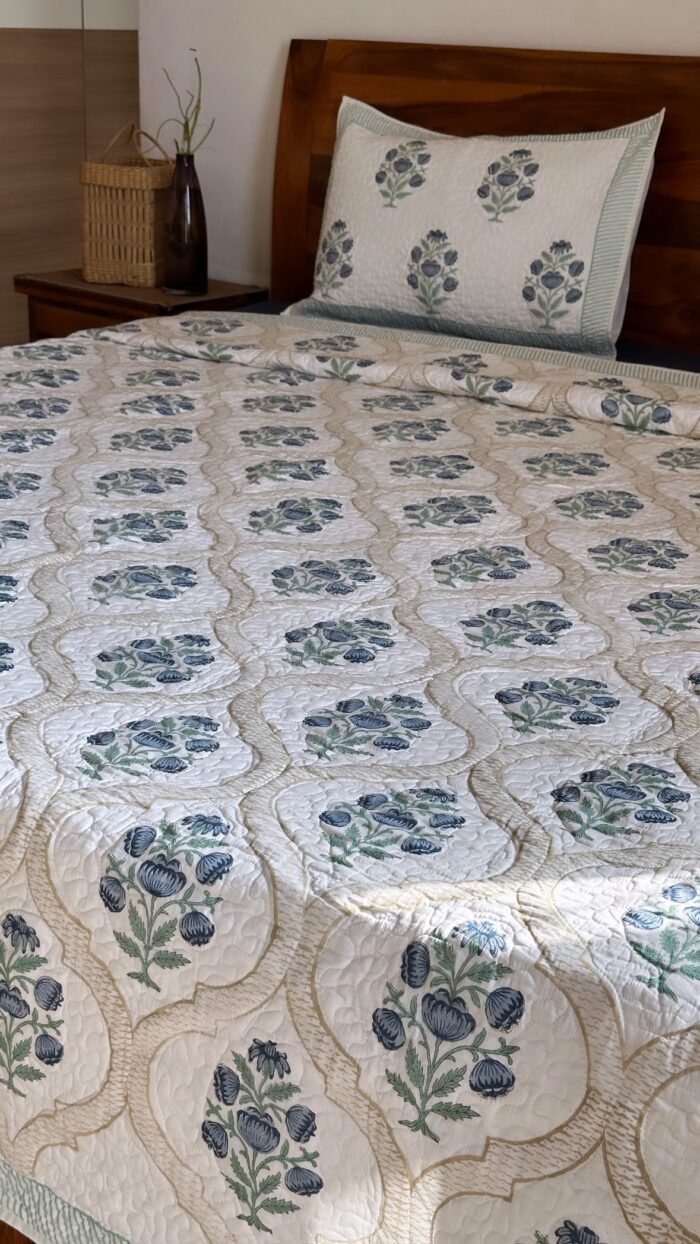 50a22429-78f2-4dbb-8092-a67c3f0e444e Blue Bouquet Handblocked Cotton Quilted Bedcover - Image 1